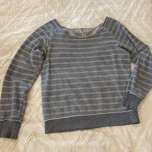 Vanity off the shoulder sweater with lace detail